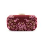 Handmade burgundy Tatreez evening clutch with pink and gold arabesque embroidery and gold clasp.
