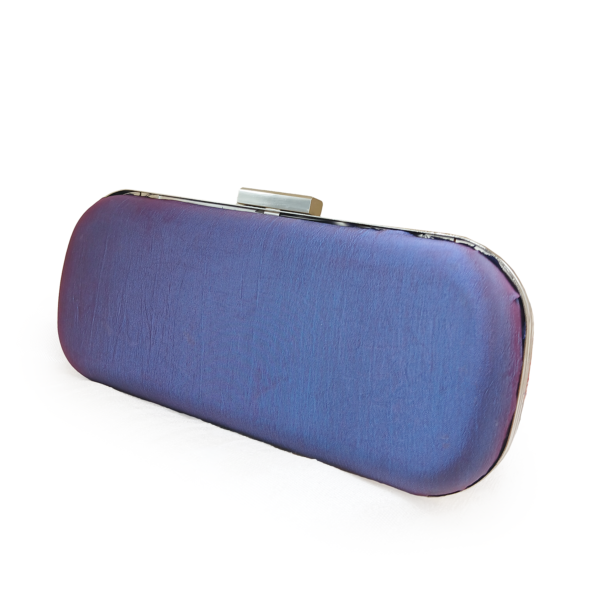 The sleek, plain purple silk reverse side of a dual-option handmade Tatreez clutch.